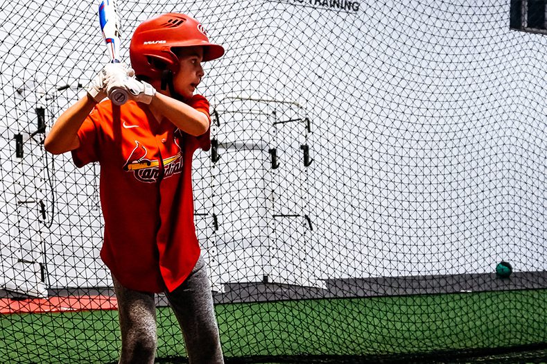 The-Baseball-Zone-kid-holding-baseball-bat The-Baseball-Zone-kid-holding-baseball-bat